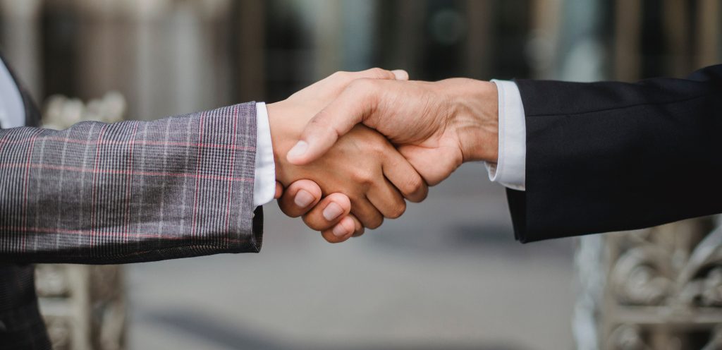 Image of people shaking hands