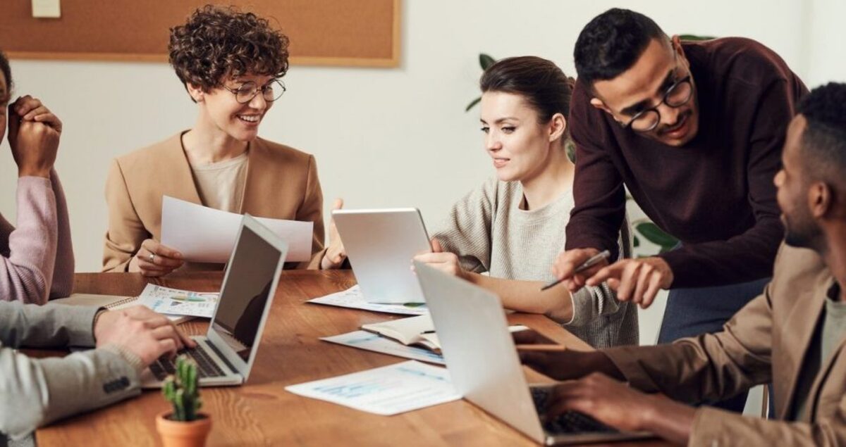 Image of people in the office talking