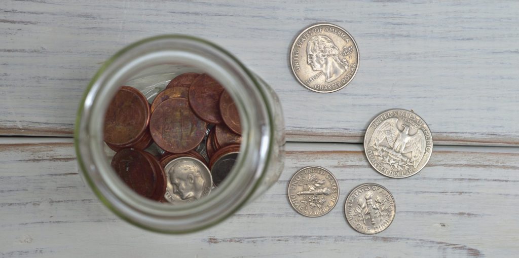 Coins inside jar