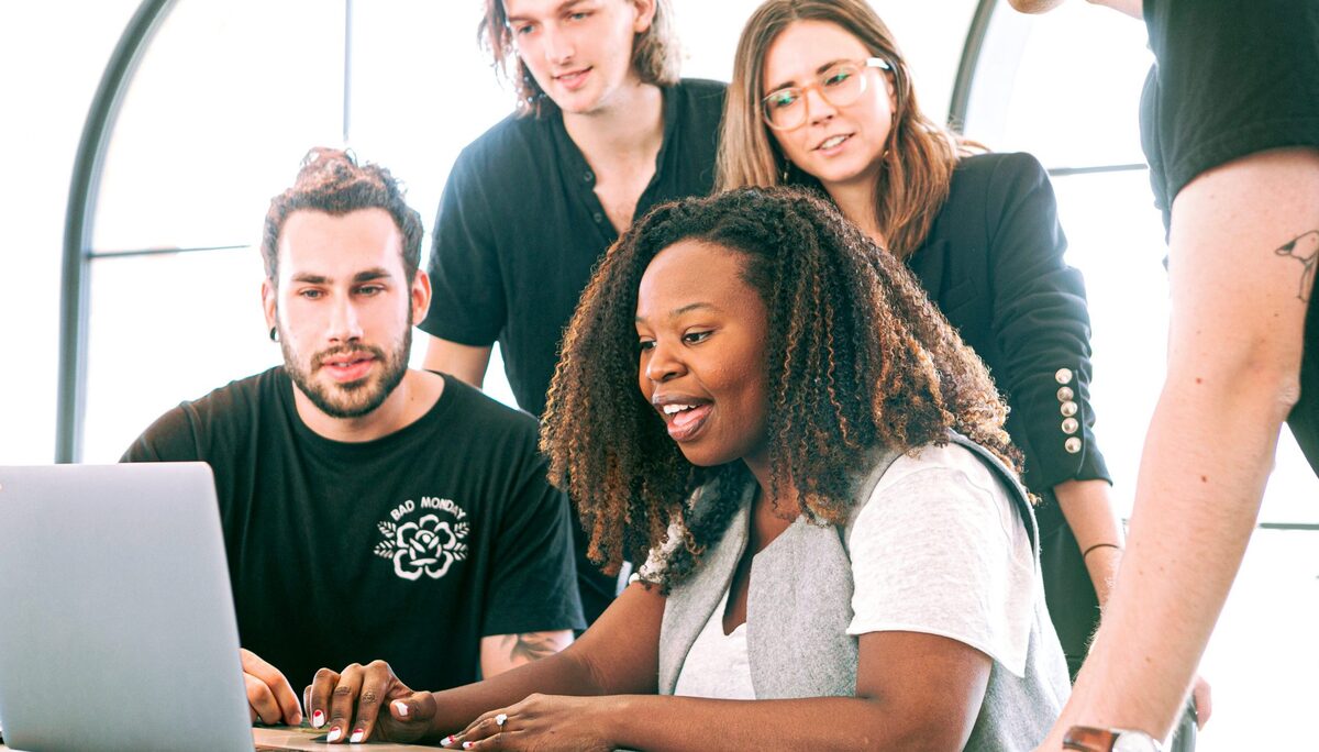 Woman sharing her presentation with her colleagues