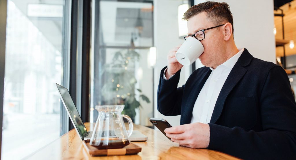 man sitting in front of table