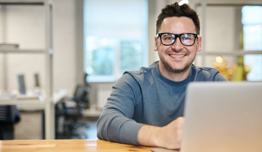 Photo of man wearing eyeglasses