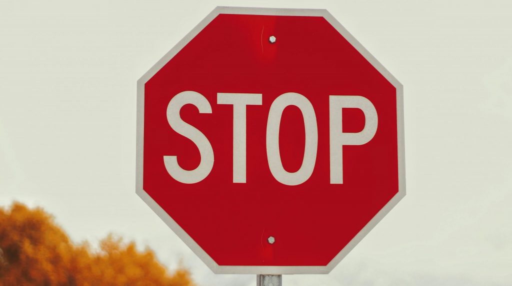 selective-photography of stop signage