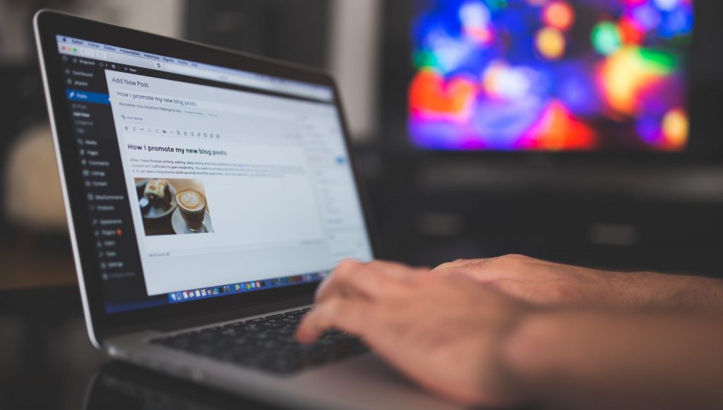 Close up of typing on a laptop