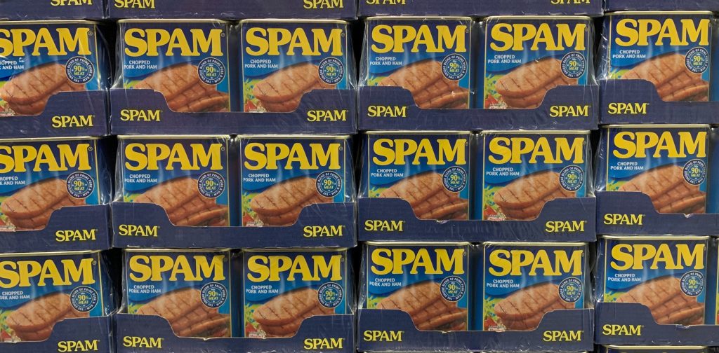 SPAM - Might be fitting if you're talking about social media spam or email spam ;)